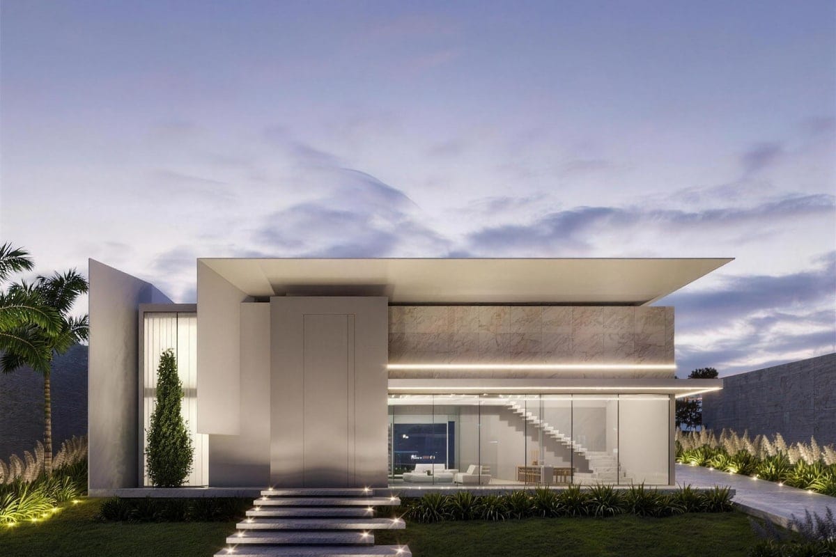 Villa de mármol y vidrio en hora azul, con la escalera interior iluminada.